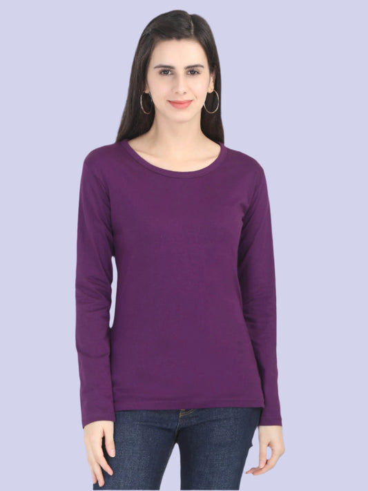 A woman wearing a purple round neck full sleeve T-shirt paired with blue jeans.
